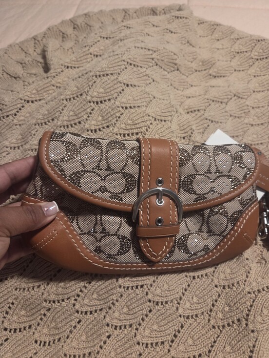Coach Handbags - Coach Tan Signature Canvas Clutch